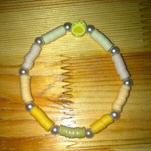 Handmade clay bead bracelet.(lemon paw)